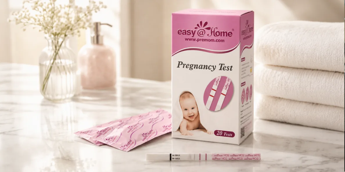 easy@Home pregnancy test kit on a bathroom counter